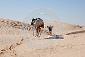 Caravan in desert Sahara