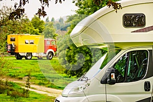 Caravan and motor home truck camping on nature