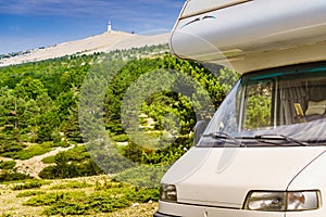 Caravan in mountains. Mont Ventoux in the distance. Provance