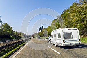 Caravan or recreational vehicle motor home trailer on a freeway