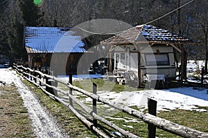 Caravan under the roof structure