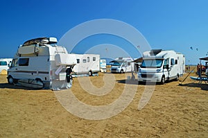 Caravans cars parked on the beach of prasonisi in rhodes island greee