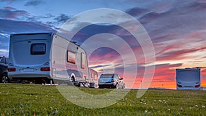 Caravans and cars sunset