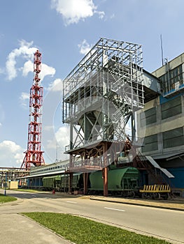 Carbamide fertilizer petrochemical plant loading railway station. Hoppers moved by electric winches or stationary train