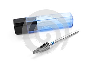Carbide milling cutter for manicure in a plastic box. Closeup. Isolated on a white background