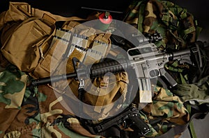 Carbine with tactical chest rigs. Military Equipment