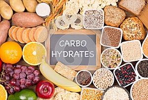 Carbohydrates food sources, top view on a table