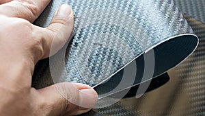 Carbon fiber specimen sample plate on white background