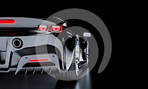 Carbon fiber sports car, rear view on a dark background