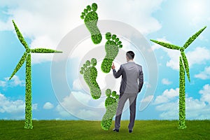 Carbon footprint concept with businessman