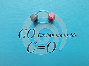 Carbon monoxide CO molecule model and chemical formula. Ball-and-stick model, 3D.