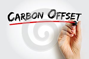 Carbon Offset - reduction of emissions of carbon dioxide made in order to compensate for emissions made elsewhere, text concept photo