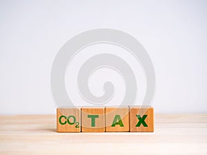 Carbon TAX, global greenhouse gas emissions (GHG). Green Co2 icon and text \