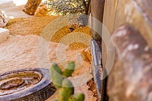 Carcass of an old rusty car in the desert