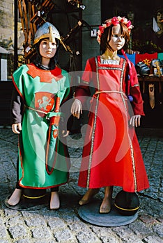 Dolls dressed in medieval clothes in the historic centre of Carcassonne, a hilltop town in southern France
