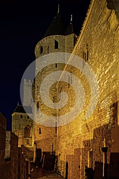 Carcassonne medieval fortress night view, old walls and towers h