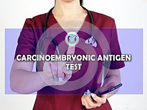 CARCINOEMBRYONIC ANTIGEN TEST CEA phrase on the screen. internist use cell technologies at office photo