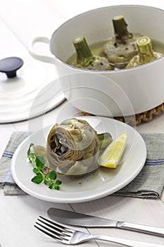 Carciofi alla Romana, Roman style boiled artichoke photo