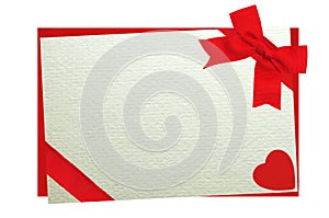 The card decorated with a red bow on envelope isolated on white