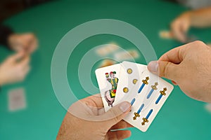 Card game with Neapolitan cards. photo