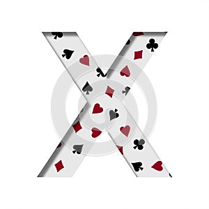 Card games font. The letter X cut out of paper on the background of the pattern of card suits spades hearts diamonds and clubs. photo