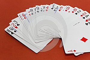 Card games on red background. Gambling and betting concept.