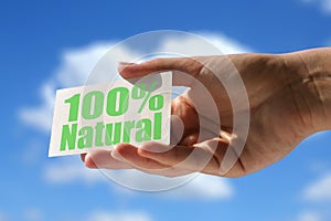 Card with 100% natural inscription