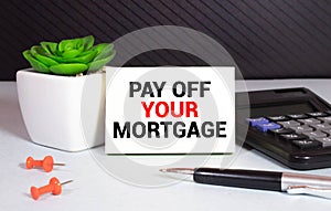 card with PAY OFF YOUR MORTGAGE message, business concept