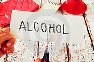 Card with the text alcohol. stop alcoholism concept
