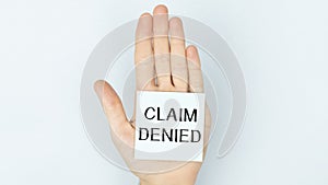 a card with text Claim Denied