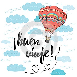 Card with text happy journey in spanish language decorated hot air balloon