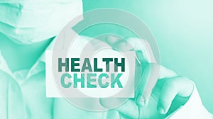 Card with text Health Check and stethoscope, medical concept