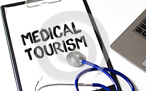 Card with text Medical Tourism, medical concept