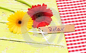 Card word relax with beautiful flowers