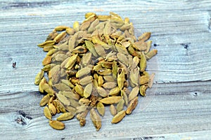 Cardamom, cardamon or cardamum, a spice made from the seeds of several plants in the genera Elettaria and Amomum in the family