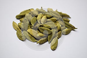 Cardamom popular Asian Indian spice aromatic with health benefits helps for immunity boosting, isolated in white background photo