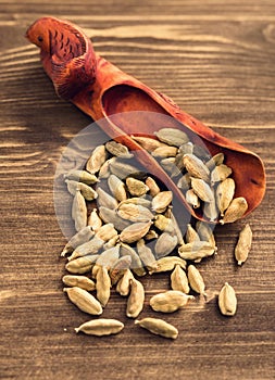 Cardamom in scoop on table