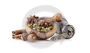 Cardamon, cinnamon, anise and nutmeg on white background. Spices isolated