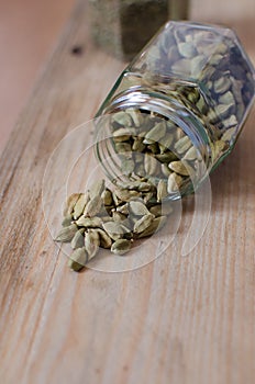 Cardamon seeds in a jar