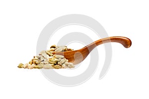 Cardamon in the wooden spoon, isolated on white background.