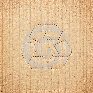 Cardboard box background with recycle symbol