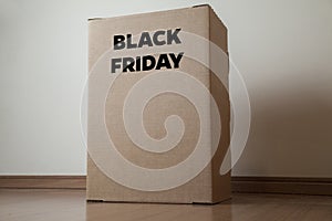 Cardboard box with black friday order written on the box