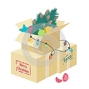 Cardboard box with Christmas decorations
