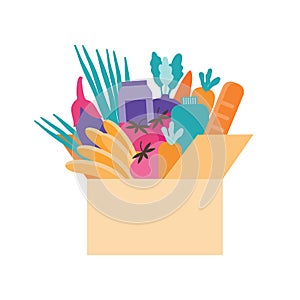 Cardboard box filled with products. Volunteer assistance. Natural food, organic fruits and vegetable. Concept of donations and