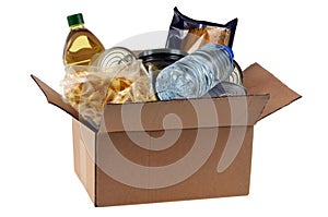 Cardboard box of food donations close up on white background