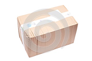 Cardboard box sealed with tape isolated on white background