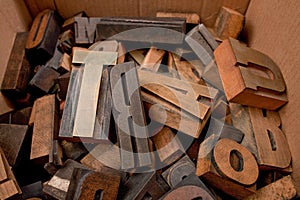 Cardboard box with wooden letters