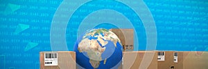 Composite image of cardboard boxes with blue globe
