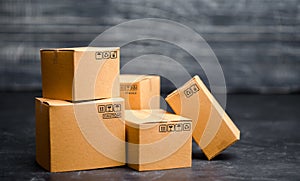 Cardboard boxes. The concept of packing goods, sending orders to customers. Warehouse of finished products and equipment. Moving