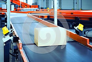 Cardboard boxes on conveyor belt.parcels transportation system concept